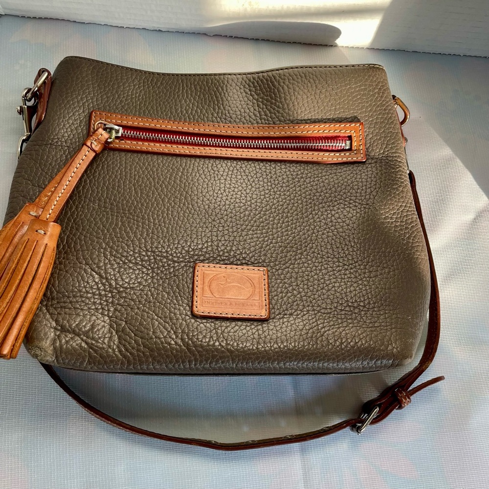 Dooney & Bourke taupe bag with tassels